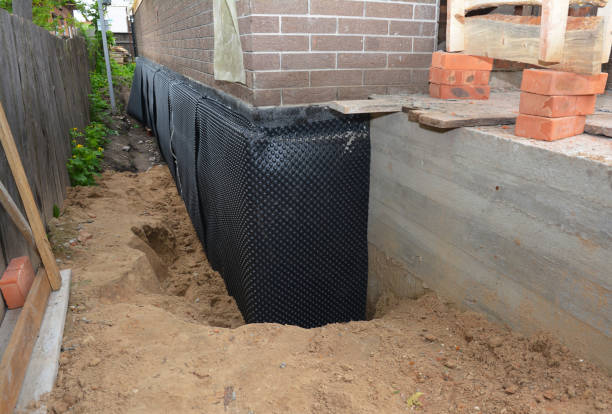 SJ Waterproofing Pros technician performing targeted Waterproofing assessment in Winnetka, IL